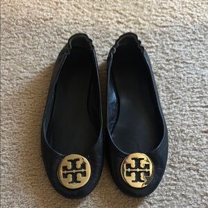 Tory Burch Black and Gold Flats with Iconic Logo